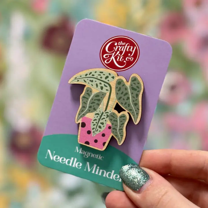 Needle Minders